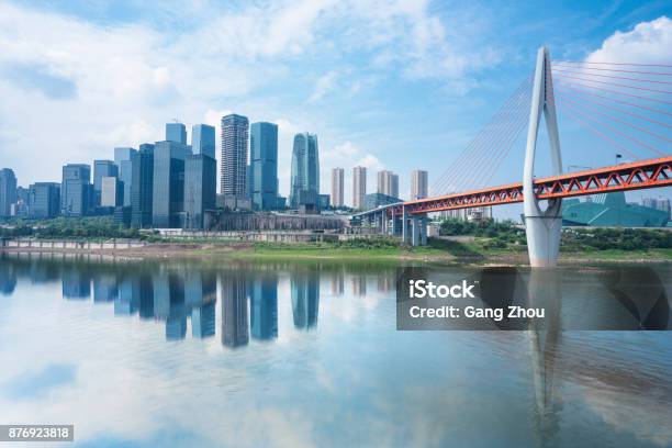 Suspension Bridge Over River In Modern City Stock Photo - Download Image Now - Chongqing, China - East Asia, City
