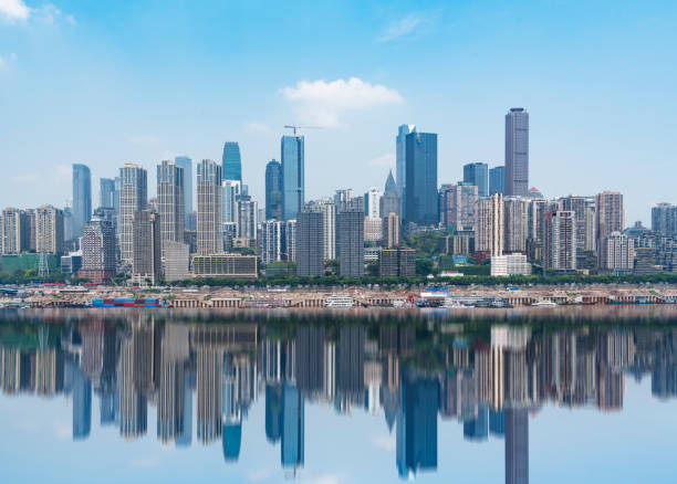 istock Chongqing waterfront financial district against sky 876926596