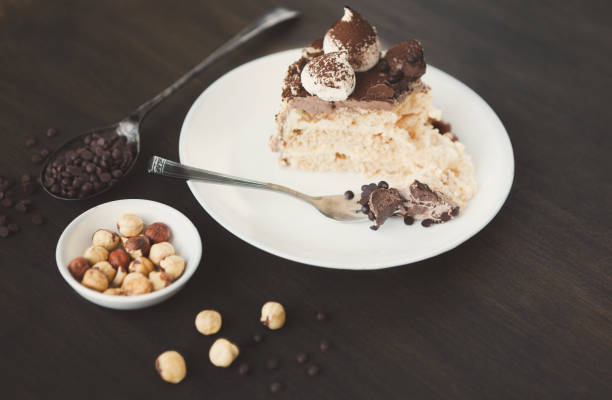 istock Meringue cake with hazelnuts and buttercream 876930306