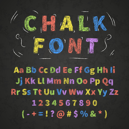 Bright colorful retro hand drawn alphabet letters drawing with chalk on black chalkboard