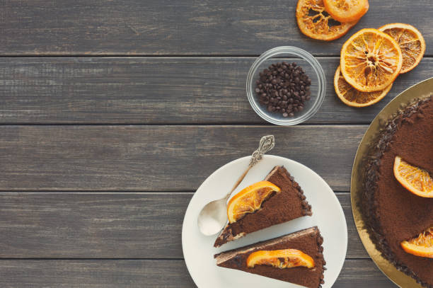 istock Chocolate cake with cream and profiterole 876930886