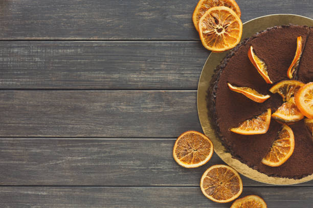 istock Chocolate cake with cream and profiterole 876930986