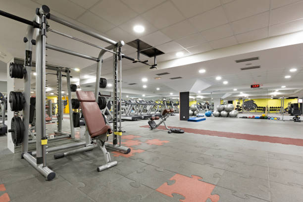 istock Interior of a gym with equipment 876931216