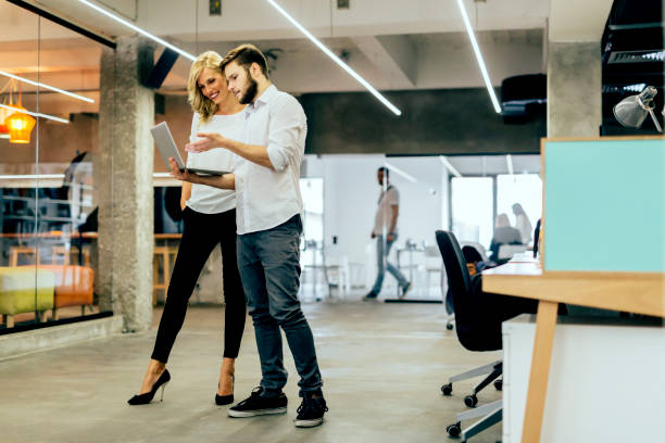 istock Discussing new ideas with a coworker 876931766