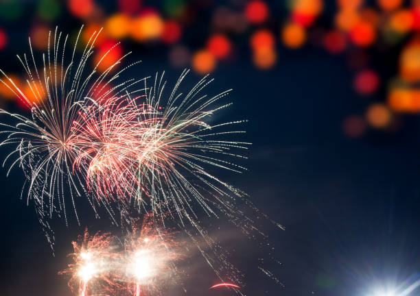 istock fireworks at New Year and copy space - abstract holiday background 876941664