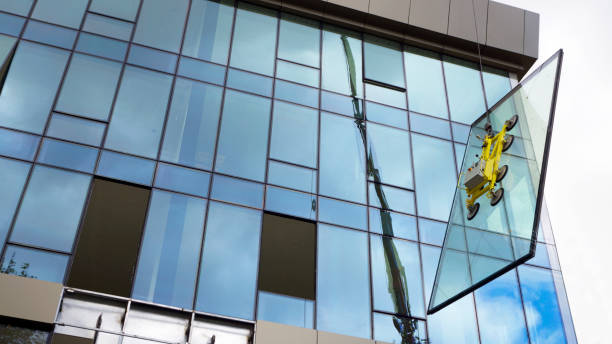 crane and glasswork at building site - glass factory imagens e fotografias de stock