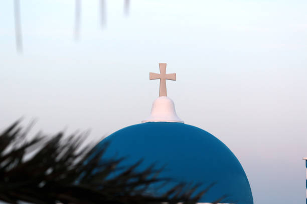 Greece Santorini, the cross on the blue dome.