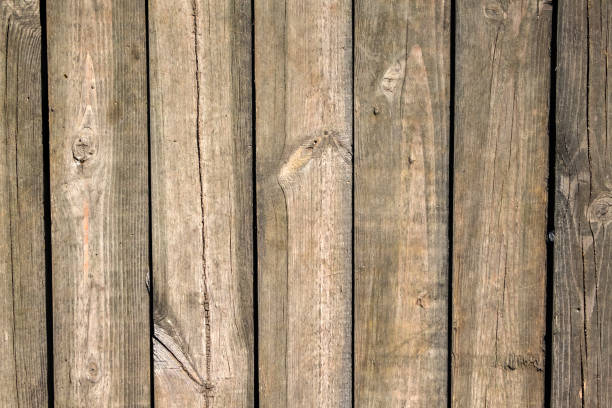 istock Vertically arranged old boards with a brown tint 876945508