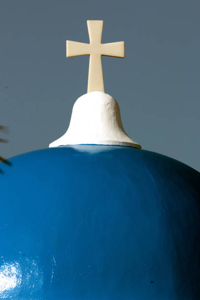 istock Greece, Santorini, the cross on the blue dome 876945672