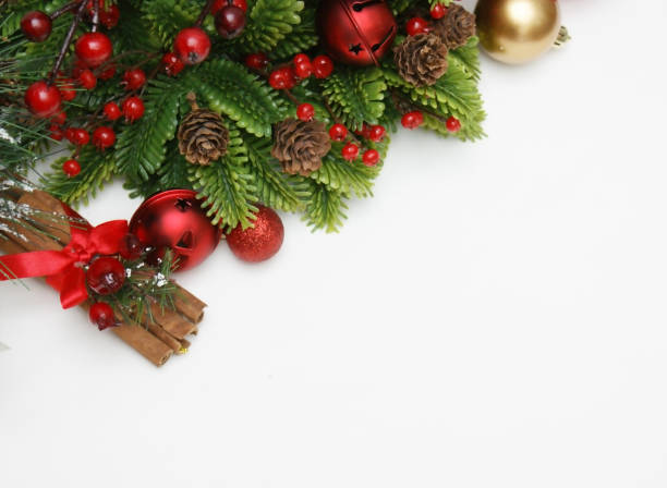 istock Christmas cinammon and decorations on white 876948386