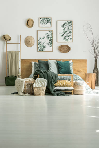 istock Hats in bright bedroom interior 876954284