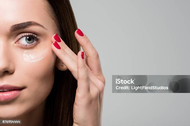 Woman Applying Facial Cream Stock Photo - Download Image Now - Moisturizer, Human Face, Anti Aging