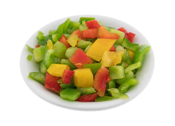 istock Chopped bell peppers in a small white bowl 876956750