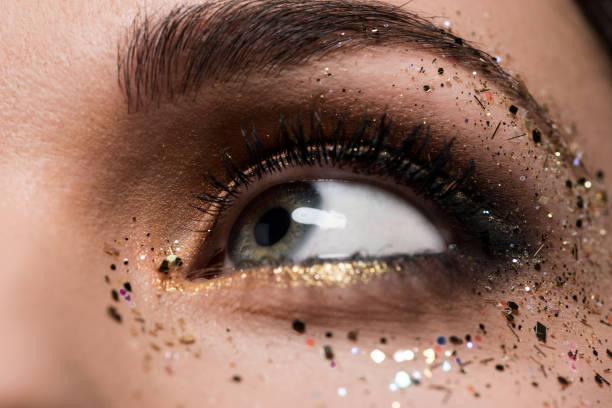 istock woman with gloss around eye 876956978