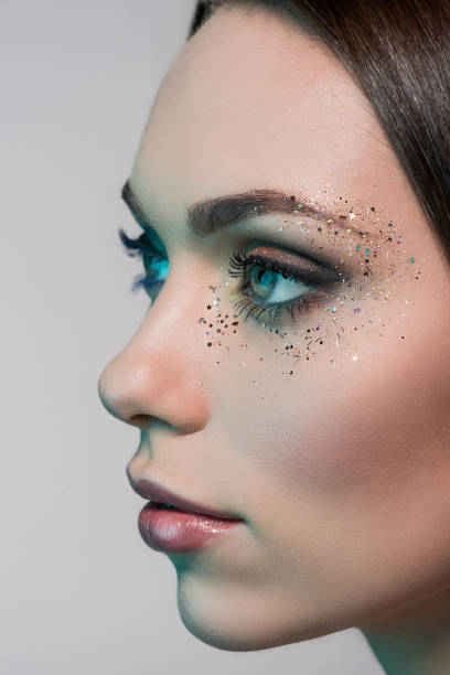 istock woman with fashion makeup 876957164