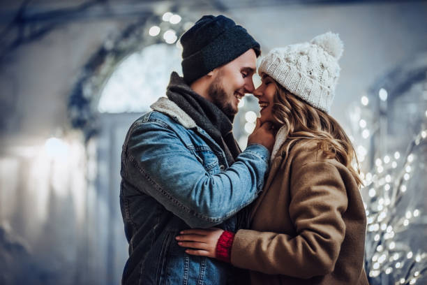 istock Young romantic couple is having fun outdoors in winter 876957346