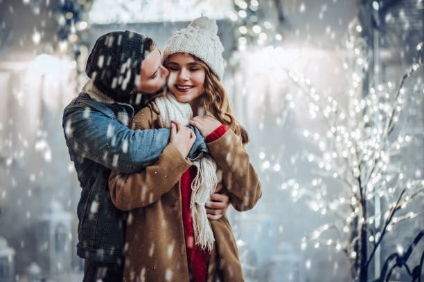 istock Young romantic couple is having fun outdoors in winter 876957392