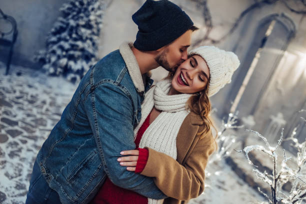 istock Young romantic couple is having fun outdoors in winter 876957984