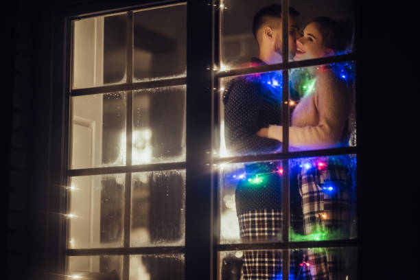 istock Young romantic couple is spending time together at home 876959040
