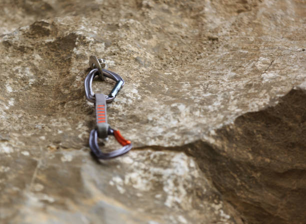 istock quickdraw on carbiner for rock climbing 876959234