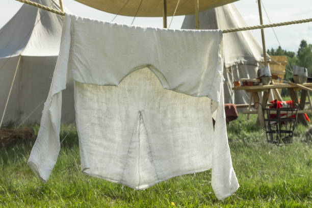 istock Vintage mens clothes hanging on the rope 876961956