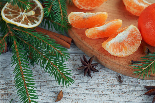 istock Mandarins (tangerines), spices and fir tree branches. 876965492
