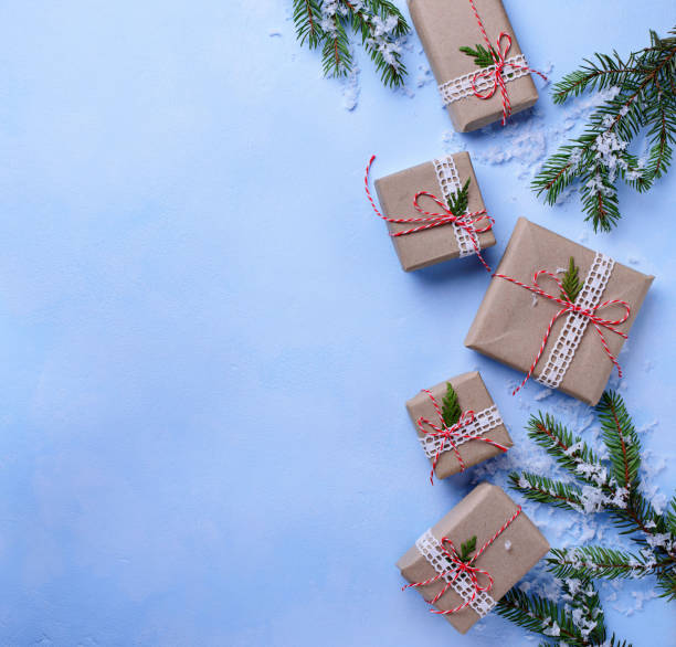 istock Christmas gift boxes in craft paper 876969392