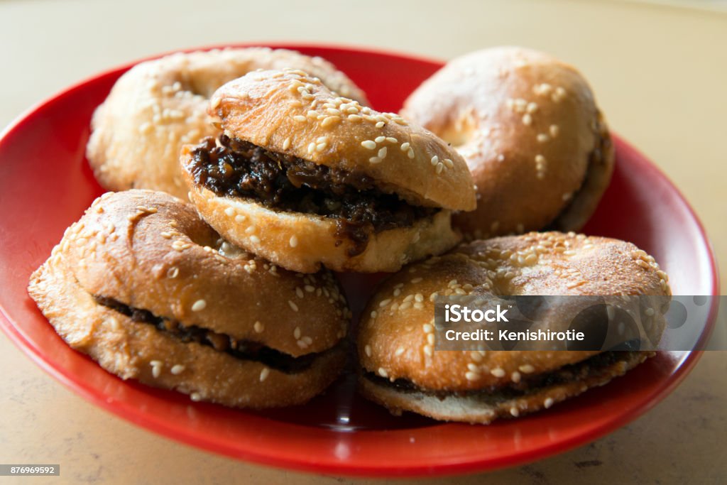 Foochow Kompia or bagel Famous Foochow style bagel stuffed with meat, or local name is Kompia Bun - Bread Stock Photo