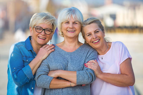 istock Group of elderly friends posing together 876970320