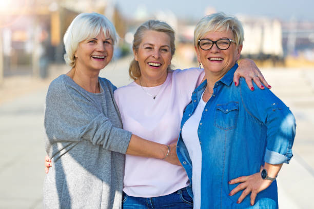 istock Group of elderly friends posing together 876970424