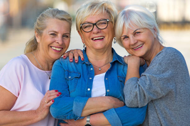 istock Group of elderly friends posing together 876970426