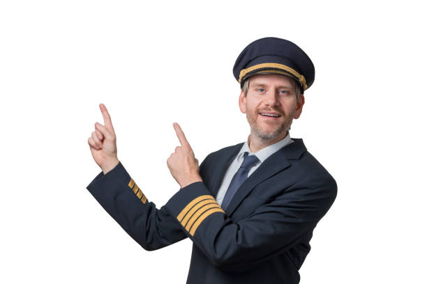 istock Captain in pilot's uniform with 4 golden stripes points into the air 876970454