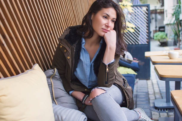 istock Lonely young woman 876970862