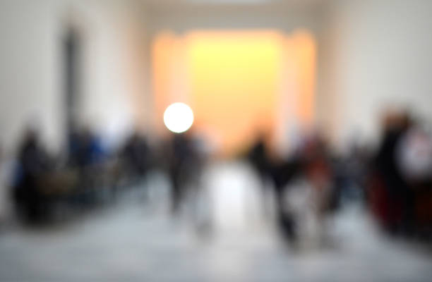 istock Blurred background many people inside the building 876970900