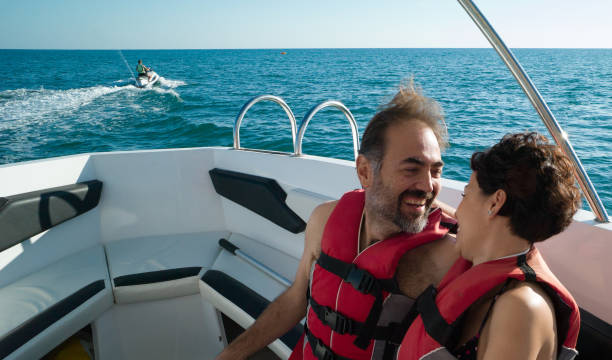 istock Lovely couple before parasailing 876971060