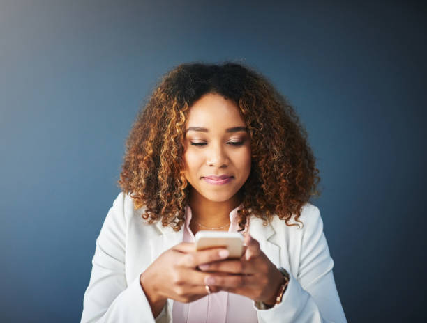 istock Checking how her business is doing on social media 876977800