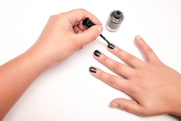 istock Nail painting in black 876982808