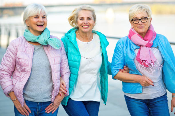 istock Group of elderly friends posing together 876982826