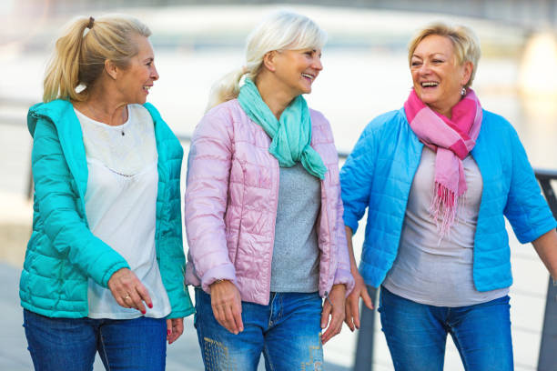 istock Group of elderly friends posing together 876983084
