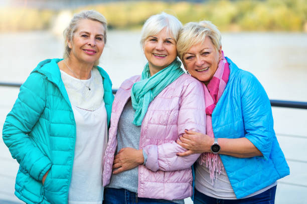 istock Group of elderly friends posing together 876983124