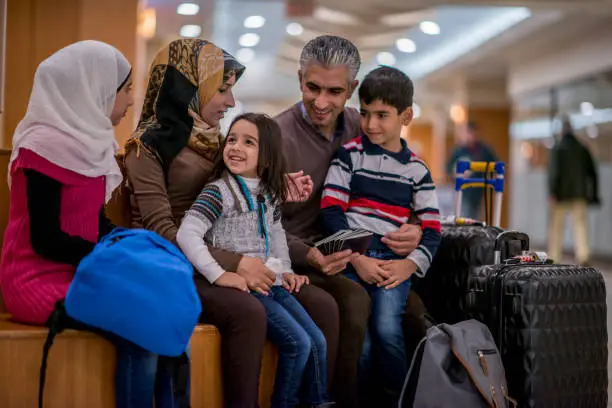 Photo of Sitting With Luggage