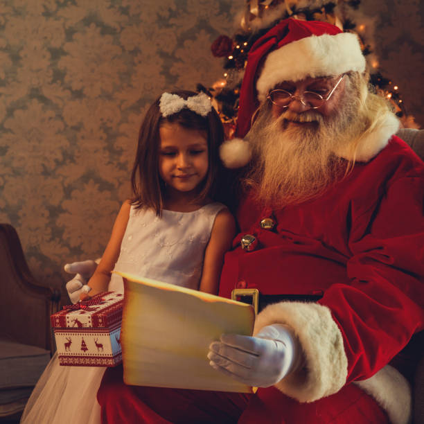 istock Santa reading fairy tales 876987026