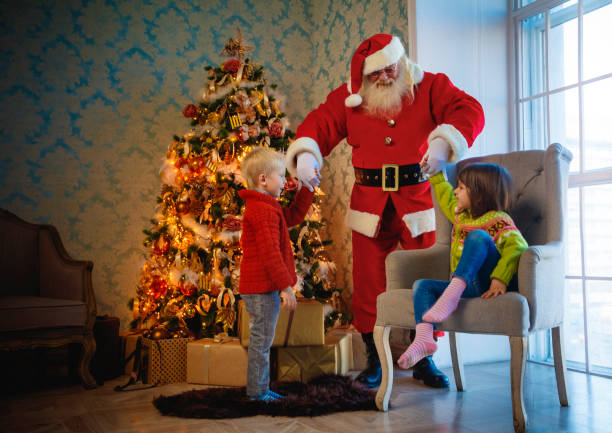 Happy kids opening their Christmas presents
