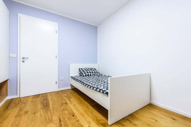 istock Modern children play room with bed and study desk. 876994122