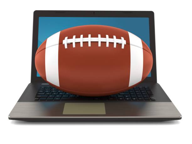 istock Rugby ball with laptop 876995264