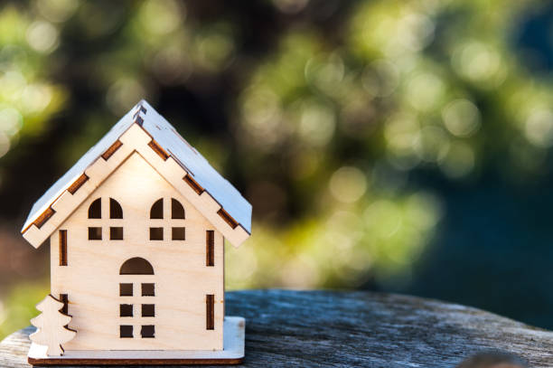 istock Toy house on a beautiful background. 876998272