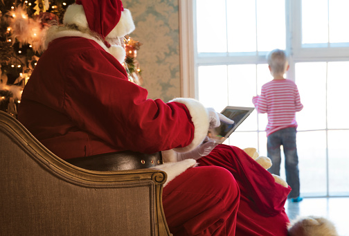 Kids and Santa using digital devices