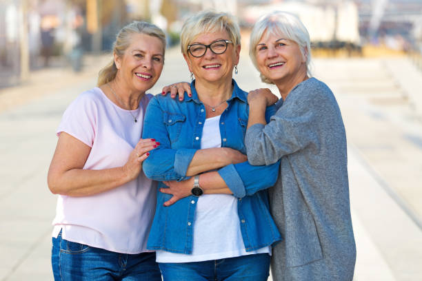 istock Group of elderly friends posing together 877006588