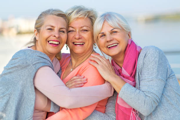 istock Group of elderly friends posing together 877006636