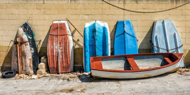 istock row of old boats 877006706